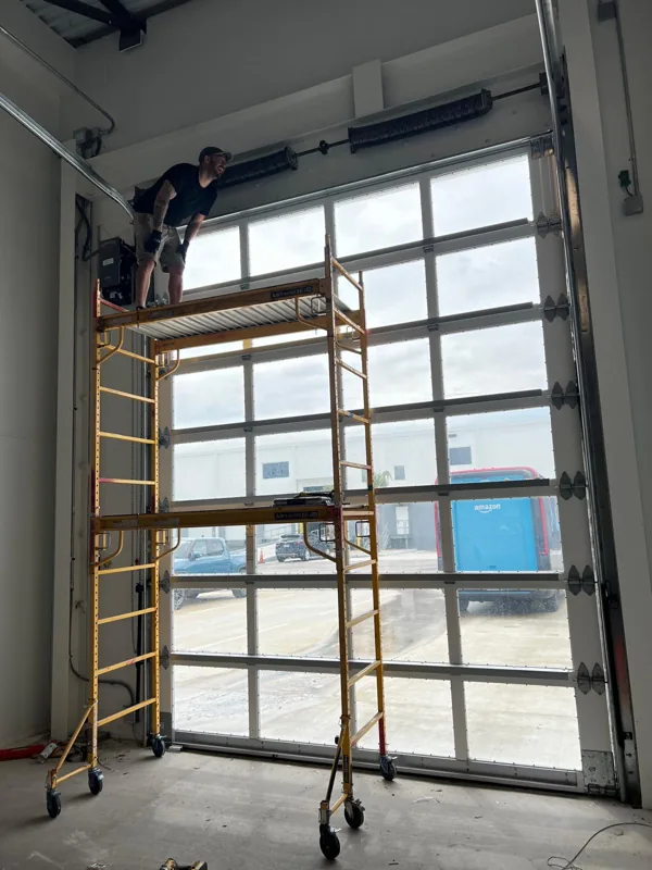 Commercial glass door by Green Garage Doors