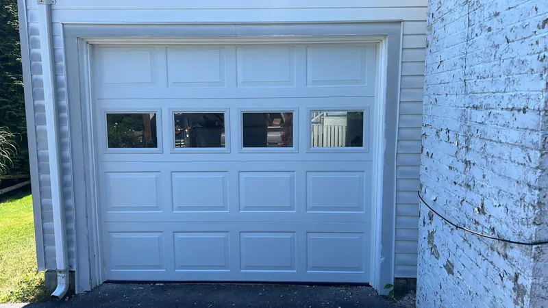 Raised-panel door by Green Garage Doors