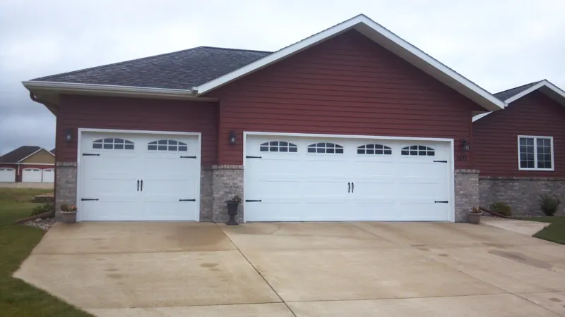 Two carriage doors by Green Garage Doors